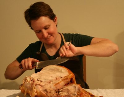 Natasha carving her Thanksgiving turkey